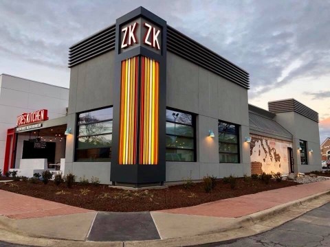 A lit ZK tower featuring the brand’s iconic stripes. (Photo: Business Wire)