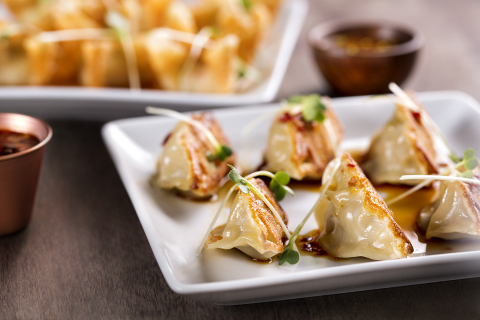 Cecilia's Dumplings are shaped like gold and silver coins from ancient China, symbolizing prosperity during Chinese New Year. At P.F. Chang's, they are stuffed and folded, each by hand, and it is said that wealth and prosperity are sealed inside. (Photo: Business Wire)