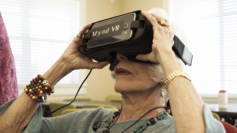 Senior Citizens in Assisted Living Homes experiencing MyndVR for the first time (Photo: Business Wire)