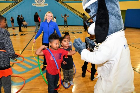 Members of Boys & Girls Clubs of the Twin Cities were led through exercises with Misty Magner-Ladner, UnitedHealthcare of Minnesota, and mascot, Dr. Health E. Hound, to test their new NERF ENERGY Game Kits that track activity earning “energy points” in order to play the game. Yesterday’s donation of 200 kits is part of a national initiative between Hasbro and UnitedHealthcare, featuring Hasbro’s NERF products, that encourages young people to become more active through “exergaming” (Photo: Matthias Orfield).