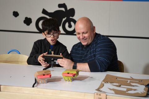 In this photo provided by Nintendo of America, kids enjoy making a Toy-Con RC Car at an exclusive event in New York on Feb. 2, 2018. Toy-Con RC Car is one of five different Toy-Con projects included in the Nintendo Labo Variety Kit, launching in stores on April 20. Nintendo Labo kits offer interactive build-and-play experiences designed to inspire creativity and discovery.