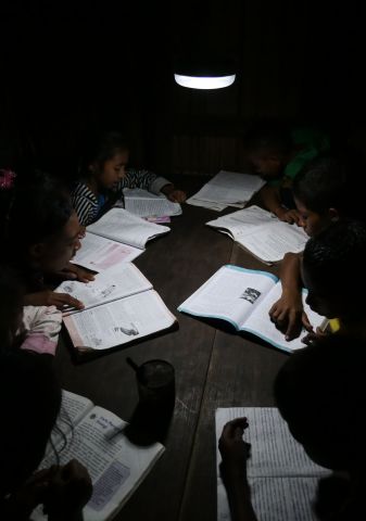 Solar lanterns are also used for supplementary nighttime studying by children. (Photo: Business Wire)