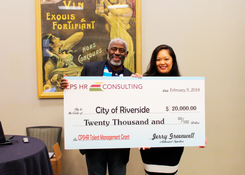 Jerry Greenwell, CPS HR Consulting CEO, awards Stephanie Holloman, City of Riverside human resources director, with $20K Talent Management Innovation Grant for Riverside at Work program. (Photo: Business Wire)