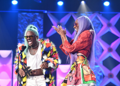 Blame It On Kway invites Lala SizaHands on stage as he accepts the LMAO award during The BET Social Awards. (Photo by Paras Griffin/Getty Images for BET)