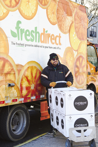 FreshDirect driver Raymond Talovera delivers donated Chobani yogurt to CS 300 in the South Bronx on Valentine's Day. (Photo Credit: Joy Kim for FreshDirect)
