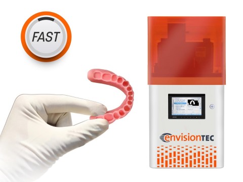 The new EnvisionTEC Vida cDLM with a larger build area delivers a print speed of 20-50 mm per hour, depending on material. Dentists, orthodontists and labs can now 3D print night guards in FDA-approved material in less than 20 minutes. (Photo: Business Wire)