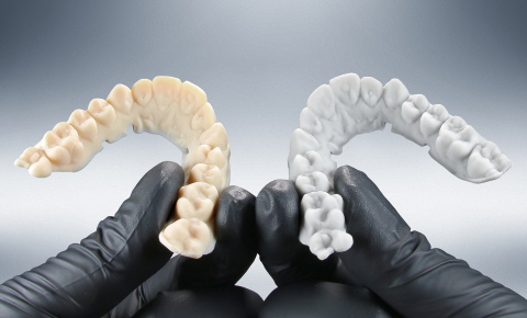 EnvisionTEC is launching an affordable new material, E-OrthoShape, shown right, for the volume production of models on which thermoformed aligners can be created. EnvisionTEC continues to offer the industry's most flexible dental materials library, which also includes E-Model Light, shown left, a premium all-purpose dental and orthodontic modeling material that delivers exceptional accuracy. (Photo: Business Wire)