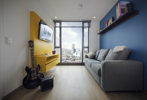 Livinn Calle 18 Living Room (Bogotá): Livinn Calle 18 in Bogotá, Colombia is a 479-bed student housing community developed by CA Ventures. The community offers students attending nearby universities an upscale lifestyle experience with well-appointed living spaces. (Photo: Business Wire)