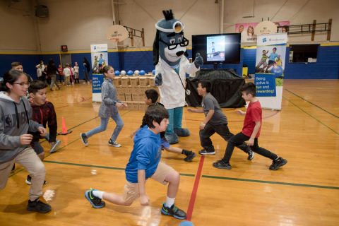 UnitedHealthcare mascot Dr. Health E. Hound led members of Boys & Girls Clubs of Tucson to test their new NERF ENERGY Game Kits. Today’s donation of 150 kits is part of a national initiative between Hasbro and UnitedHealthcare, featuring Hasbro’s NERF products, that encourages young people to become more active through “exergaming” (Photo: Laura Segall).