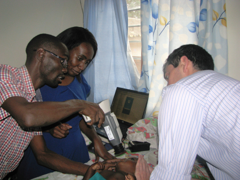 Volk’s Pictor Plus camera being used to image a patient with cerebral malaria. (Photo: Business Wire)