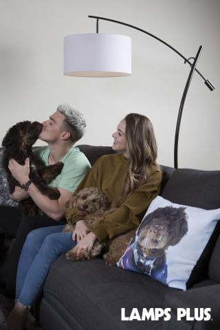 Enrique "Kiké" Hernandez of the Los Angeles Dodgers and fiancée Mariana Vicente enjoy time at home with their dogs, Bruce and Arizona. A Lamps Plus custom photo pillow features a photo of Bruce in the snow. (Photo: Lamps Plus)