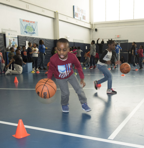 Adjahani, a local Hartford Boys & Girls Club member, goes through a basketball drill during the kick-off event for National Boys & Girls Club Week. UnitedHealthcare and Hasbro sponsored the event by donating 100 NERF ENERGY Game Kits to the Boys & Girls Clubs of Hartford's Asylum Hill Unit. This initiative between Hasbro and UnitedHealthcare is designed to encourage kids to increase physical activity. The kits feature Hasbro's NERF products that are designed to encourage young people to become more active through "exergaming" (Photo: Alan Grant / Digital Creations).