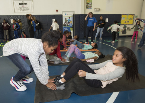 Nyasia and Xophia, local Hartford Boys & Girls Club members, do sit-ups before rotating to another physical activity during the National Boys & Girls Club Week kick-off event hosted by UnitedHealthcare and Hasbro. UnitedHealthcare donated 100 NERF ENERGY Game Kits to the Boys & Girls Clubs of Hartford's Asylum Hill Unit. This initiative between Hasbro and UnitedHealthcare is designed to encourage kids to increase physical activity. The kits feature Hasbro's NERF products that are designed to encourage young people to become more active through "exergaming" (Photo: Alan Grant / Digital Creations).