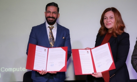 Dr. Ghada Hanin, AUT president signing the agreement with Mr. Ramiz Haddadin, Regional Commercial Head, Cambridge Assessment English (Photo: AETOSWire)