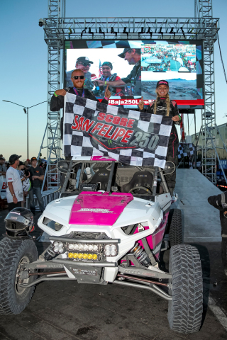 Kristen Matlock and Co-Driver Matthew Strandberg celebrate their victory (Photo: Business Wire)