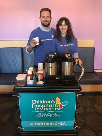 Actors Patrick J. Adams and Troian Bellisario supported the Make March Matter campaign by volunteering at Children's Hospital Los Angeles on March 15, 2018. (Photo: Business Wire)