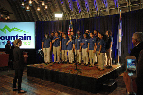 The Mountain Mission School Choir sings the national anthem at the event announcement (Photo: Business Wire)