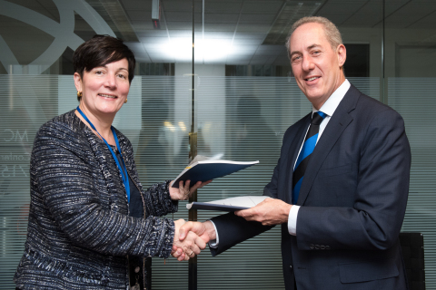 Stephanie von Friedeburg, IFC Chief Operating Officer and Michael Froman, Vice Chairman and President, Strategic Growth at Mastercard Sign Updated Agreement in Washington, DC on Sunday During the World Bank's Annual Spring Meeting. (Photo: Business Wire)