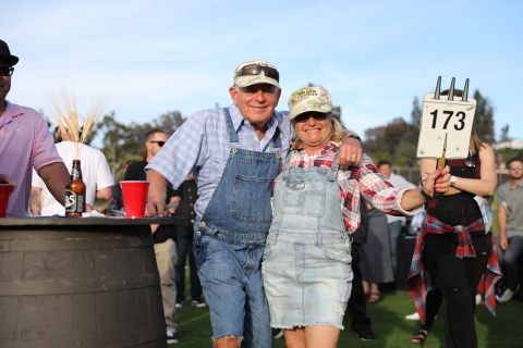 TILLYS Co-Founder and TLC Founder, Tilly (right) and her Husband Larry Levine (left) Dressed to Impress and Bidding for Live Auction Items (Photo: Business Wire)