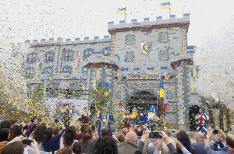 Confetti bursts over a crowd of media and royal guests at the grand opening of LEGOLAND® Castle Hotel. (Photo: Business Wire)