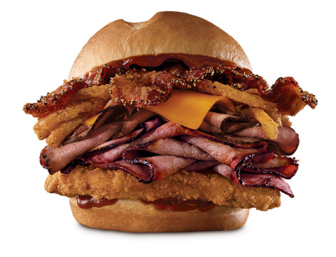 Arby's Bourbon BBQ Triple Stack features a barrel-aged Kentucky bourbon barbecue sauce on top of 13-hour smoked brisket, USDA-choice Angus Steak, buttermilk chicken filet, brown sugar bacon, natural cheddar and crispy onions. (Photo: Business Wire)