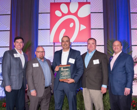 Left to Right: Brian Wray of Chick-fil-A, Bill Jarvis, Rene Acuna and Jeff Bass of McLane and Tim Tassopoulos of Chick-fil-A. (Photo: Business Wire)