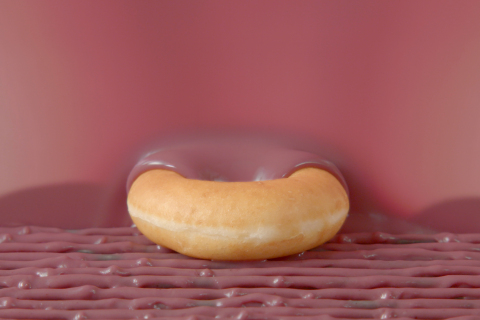 The all-new Blueberry Glaze Doughnut will be available for one week only, May 21-27 at participating Krispy Kreme shops across the United States and Canada. (Photo: Business Wire)