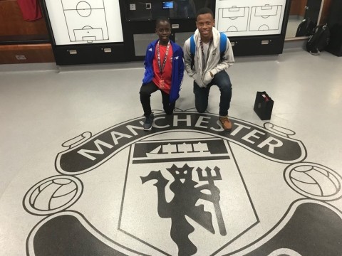 Paying homage to the great MUFC: Flow Skills 2018 winners - Jamaica’s Brian Burkett and Barbadian Nathan Skeete enjoy the Manchester United Museum tour in the UK. (Photo: Business Wire)
