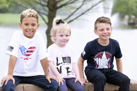 Grunt Style launched a patriotic-themed clothing line for toddlers and youth at www.gruntstyle.com. The unisex collection, comprised of 14 playfully designed, Made-in-the-USA T-shirts, celebrates love of country, freedom and bacon. All kid's shirts are backed by an industry-leading Root Beer Guarantee. (Photo: Business Wire)