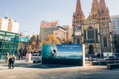 Corona advertisement before being hijacked with 1500KG plastic wave to raise awareness for marine plastic pollution. (Photo: Business Wire)