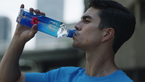 FIJI Water puts the new Sports Cap bottle to the ultimate fitness test in new TV campaign. (Photo: Business Wire)
