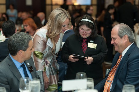 From Left to Right: New York Stock Exchange Global Head of Listings and Services, Chris Taylor, National Down Syndrome Society President and CEO, Sara Hart Weir, Self Advocate, Emma Mandel, and Voya Financial Chairman and CEO, Rodney O. Martin, Jr., together at the C21 event in New York City on Monday, June 4. (Photo Credit: Wendy Zook) (Photo: Business Wire)