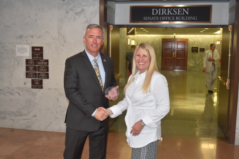 Representative John Katko (R-NY) receives the Navigator Award from GBTA President Christle Johnson (Photo: Business Wire)