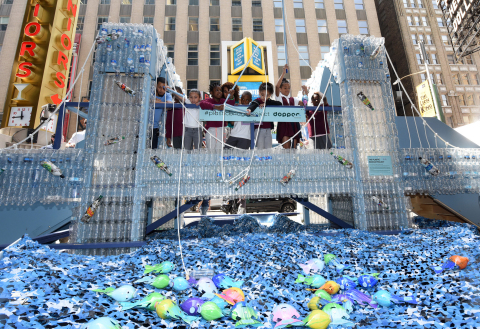Children from PS 175 in New York fished for solutions on Dopper Foundation's Plastic Bridge - a replica of the Brooklyn Bridge made of 5,000 recycled single-use plastic water bottles. Dopper Foundation unveiled the Plastic Bridge on World Oceans Day in Times Square, in collaboration with National Geographic Encounter. (Photo by Diane Bondareff)
