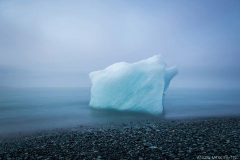 Second Place: THE END IS NEAR | ICELAND "This ice could be thousands of years old, and only recently broke off the Vatnajokull Glacier at Jokulsarlon Bay in Iceland, and will soon melt into the sea. Taken July 2017 in Iceland." Photo by Andre Mercier, Los Angeles, California, USA.