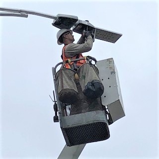 Installation of one of Portland's Current by GE CityIQ nodes (Photo: Business Wire)