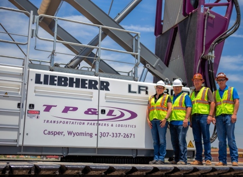 Left to Right: TP&L’s Founding Partners and Executive Management Shelli Stacey, Billy Brenton, Jim Orr and Justin Orr with the company’s new Liebherr LR 1300 SX crawler crane. (Photo: Business Wire) 