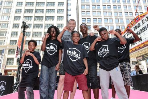 PFL Fighter Brian Foster and Kids from the Englewood Crushers Club Work Out at the Chicago Theatre (Photo: Business Wire)