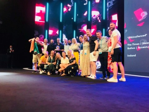 The Rothco team takes the stage during Thursday evening's Cannes Lions Creative Data ceremony for its celebrated 'JFK Unsilenced' campaign. (Photo: Business Wire)