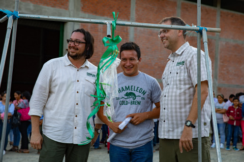 Chameleon Cold-Brew Director of Coffee Matt Swenson (L), Cenfrocafe Quality Lab Manager Herly Silva and Chameleon CEO and Co-Founder Chris Campbell (R) commemorate the opening of the Cenfrocafe Coffee Quality lab and milestone sustainability project with ribbon cutting ceremony in San Ignacio, Peru. (Photo: Business Wire)