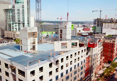 Prefabricated and prefinished exterior wall panels were used to build SOVA Apartments to alleviate construction constraints and create a predictable project schedule. (Photo: The Weitz Company)