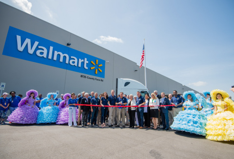 Walmart executives, Governor Kay Ivey and local and state officials celebrate the grand opening of the $135 million import distribution center in Irvington. The distribution center will help support more than 700 Walmart stores across the South. (Photo: Business Wire)
