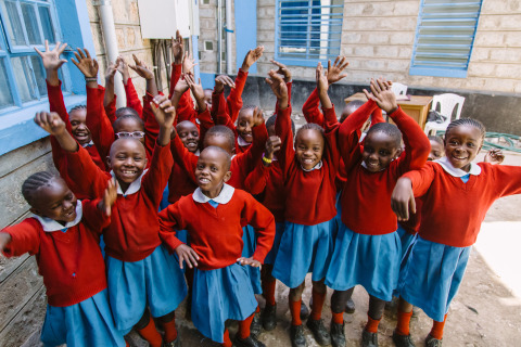 A group of Mathare School for Girls Grade 2 pupils showing their enthusiasm for being in school. Photo courtesy of SHOFCO.