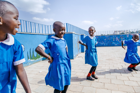 Kibera School for Girls (KSG) Grade 2 pupils (Whitney Oneya, Brenda Awuor, Suzy Akoya & Sarah Awuor) enjoying break time on the new KSG building rooftop. Photo courtesy of SHOFCO.
