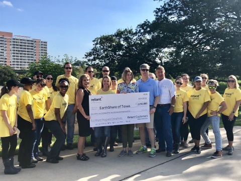 Reliant employees volunteer at Buffalo Bayou Park to celebrate the company's donations to EarthShare ... 
