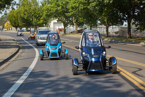 Arcimoto FUVs flank the ceremonial first Uber ride through Eugene streets. (Photo: Business Wire)