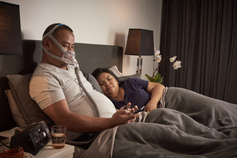 AirFit F30 full face CPAP mask: Man wearing in bed (Photo: Business Wire)