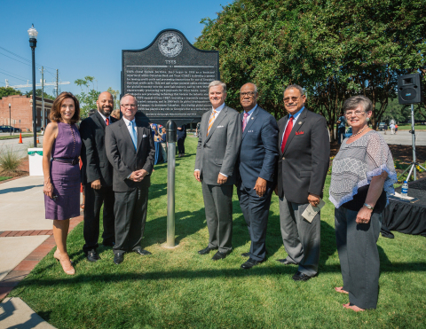 TSYS and Georgia Historical Society Marker Unveiling. Pictured (left to right): Teresa Tomlinson, Mayor of Columbus; Bruce Huff, Columbus City Councilor; Dr. Todd Groce, President & CEO, Georgia Historical Society; M. Troy Woods, Chairman, President & CEO, TSYS; State Representative Calvin Smyre (GA, District 135); U.S. Representative Sanford Bishop (GA, 2nd District); Sherry Fredrick, TSYS team member. (Photo: Business Wire)
