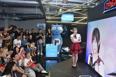 Aijia from SNH48 interacting with her Personal AI (PAI) at the Shanghai World AI Conference (Photo: Business Wire)