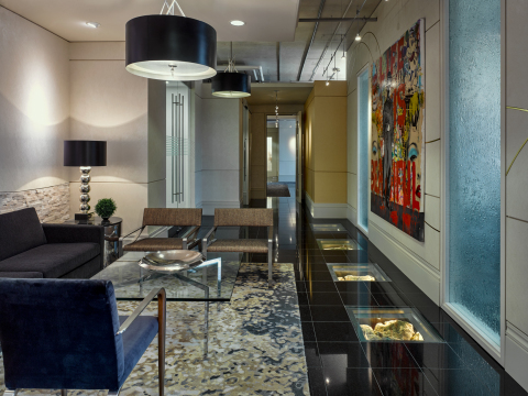 The reception area features precious mine samples placed inside recessed illuminated boxes which alludes to the feeling of being underground (Photo: Ben Rahn of A-Frame Studio)